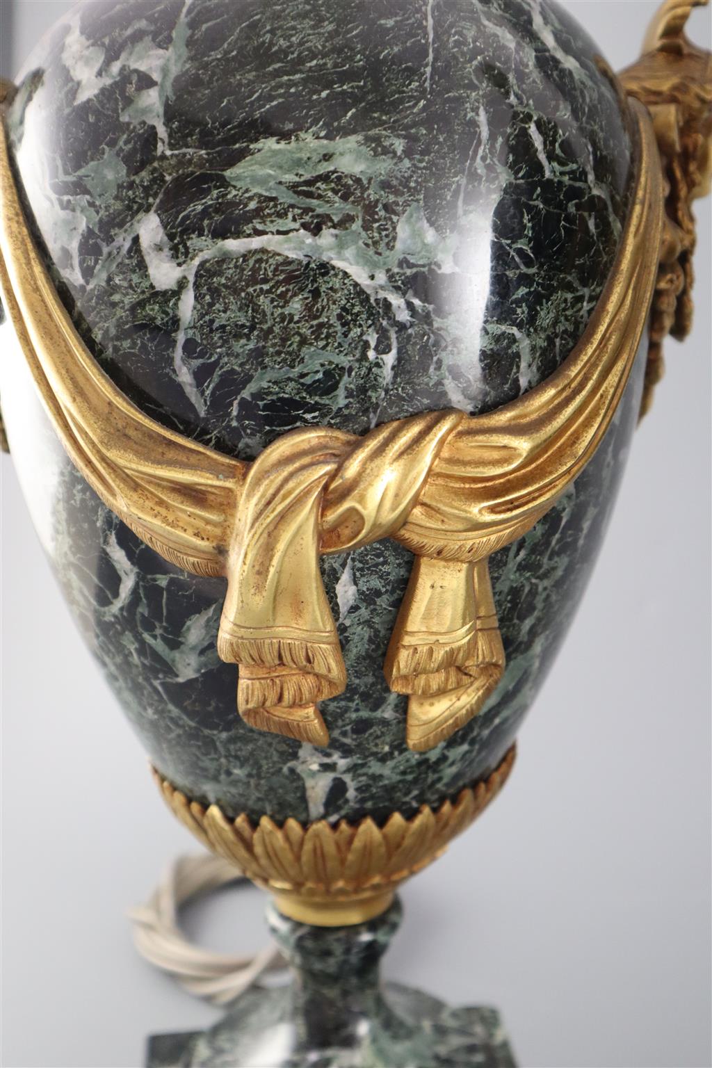 A pair of early 20th century ormolu green marble table lamps, overall height 20in.